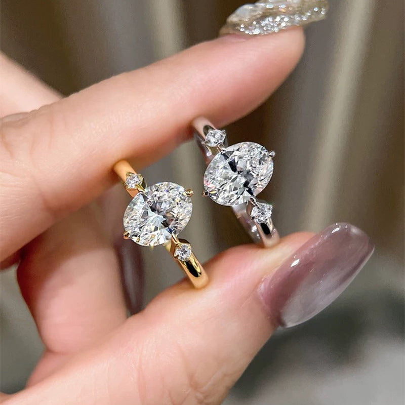 Classic Three-Stone Oval Diamond Engagement Ring