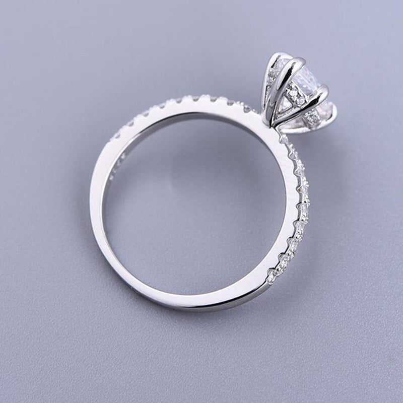 Hidden Halo Marquise Cut Ring. White Gold Plated