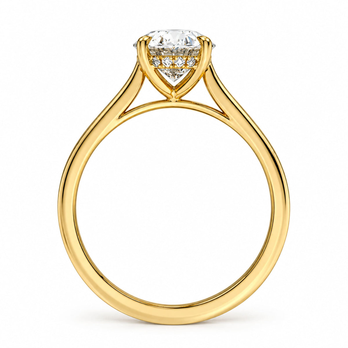 Profile view of the Celeste oval hidden halo moissanite ring in yellow gold plated silver