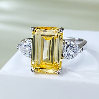 Yellow Diamond 4 CT Emerald Cut Three-Stone Ring