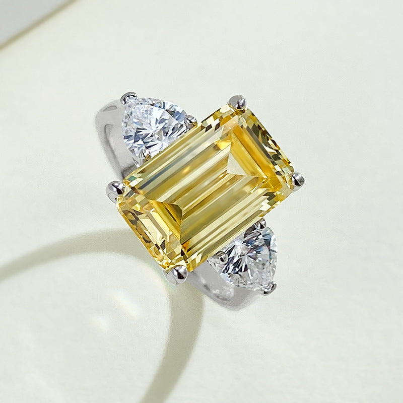 Yellow 4 Carat Emerald Cut Three-Stone Silver Ring