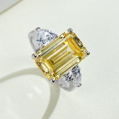 Yellow 4 Carat Emerald Cut Three-Stone Silver Ring