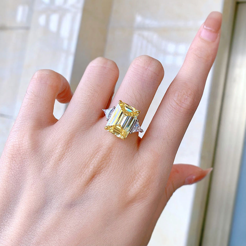 Yellow Diamond 6.5 CT Emerald Cut Three-Stone Ring