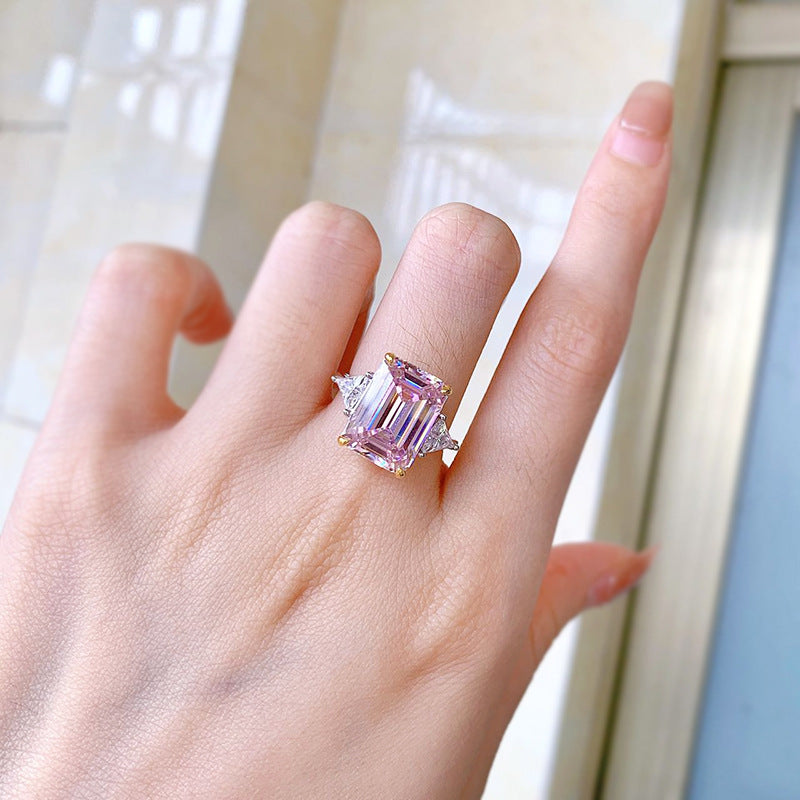 Pink Diamond 6.5 CT Emerald Cut Three-Stone Ring