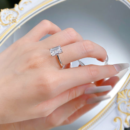 White gold plated. emerald cut silver ring