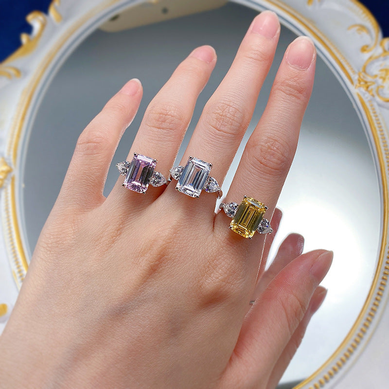 4 CT Emerald Cut Three-Stone Ring. Silver 925. White Gold Plated 