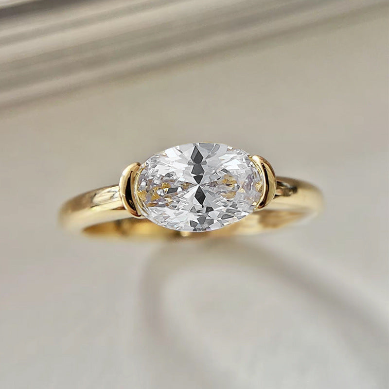 Half Bezel Oval Cut Ring
