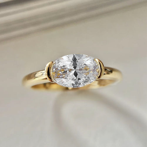 Half Bezel Oval Cut Ring