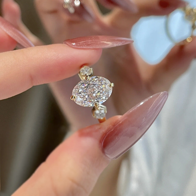 Three-Stone Oval Diamond Engagement Ring 