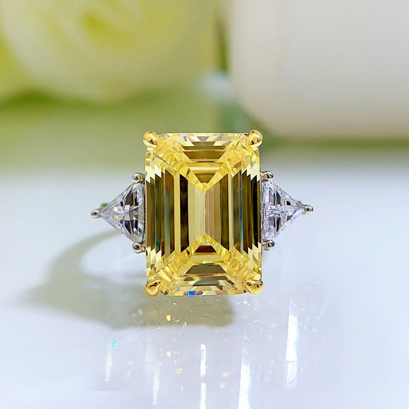 6.5 CT Yellow Diamond Emerald Cut Three-Stone Ring