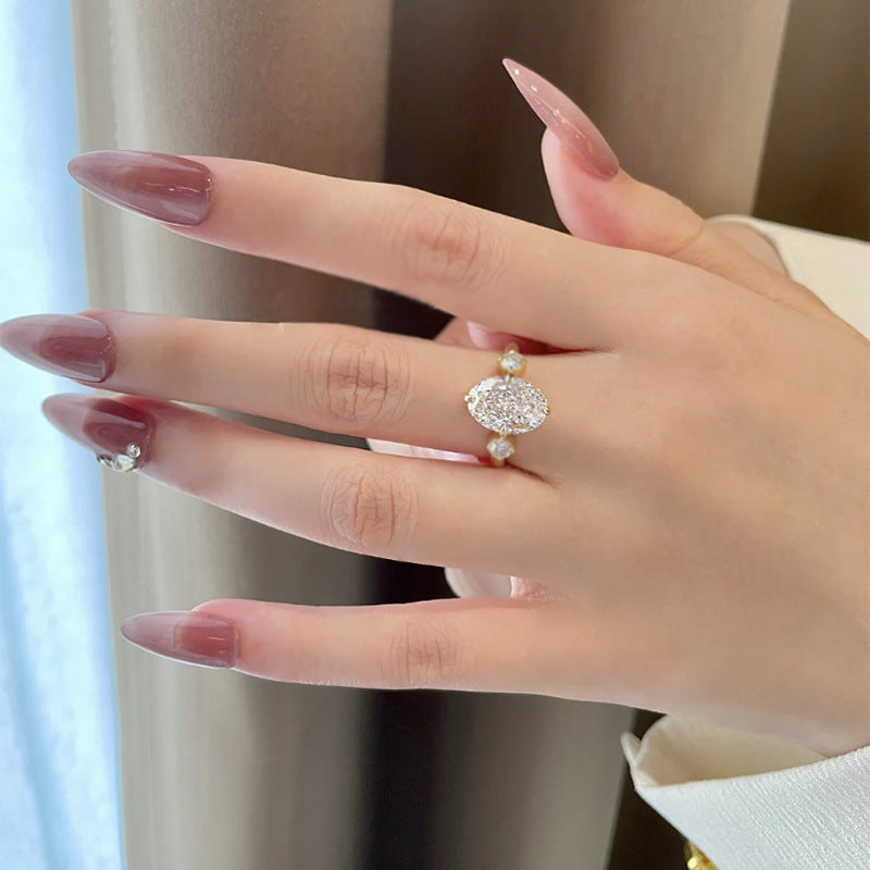 Three-Stone Oval Diamond Engagement Ring . Silver 925. Gold Plated Ring
