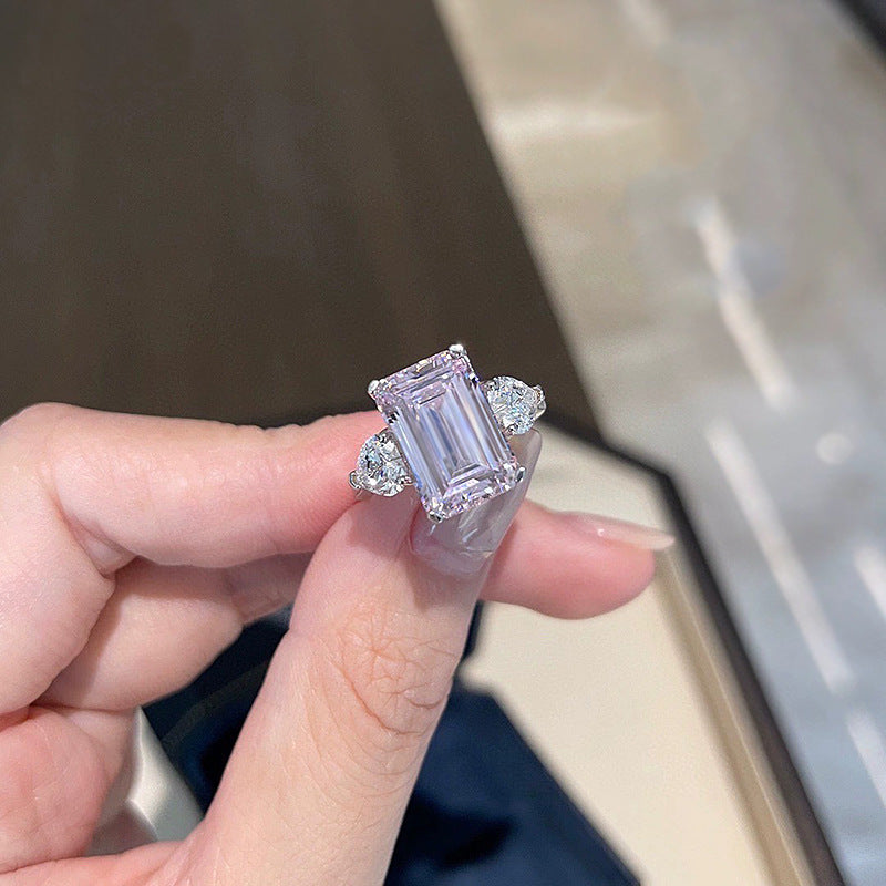 4 CT Emerald Cut Three-Stone Ring. Silver 925