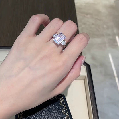White Diamond 4 CT Emerald Cut Three-Stone Ring