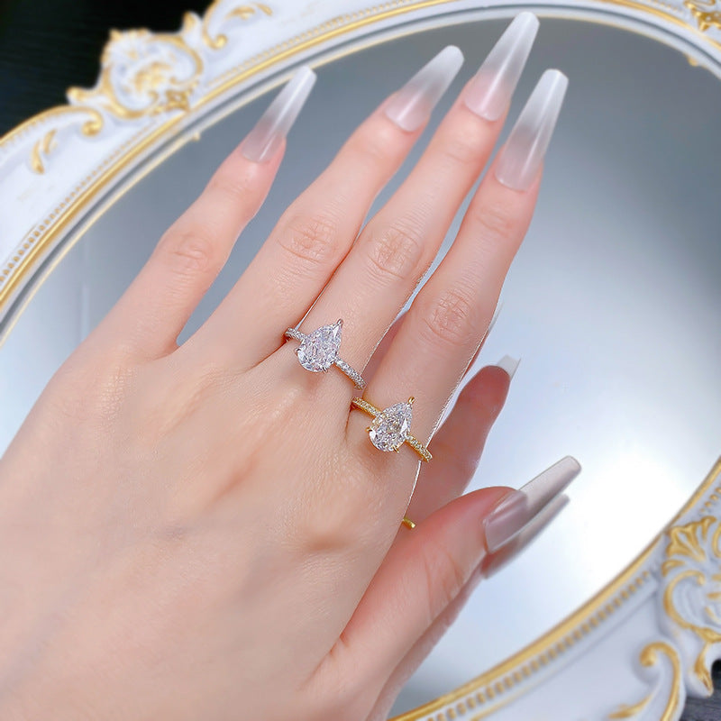 Radiant Teardrop Elegance Ring. White Gold and Gold Plated Silver Ring