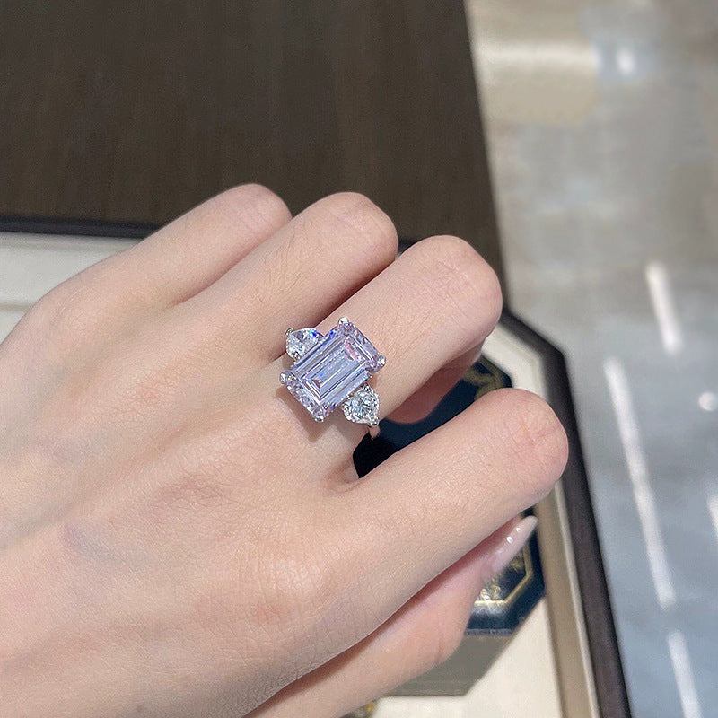 4 Carat Emerald Cut Three-Stone Ring