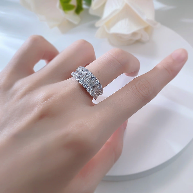 Emerald and Round Cut Diamond Band in Silver 925. White Gold Plated