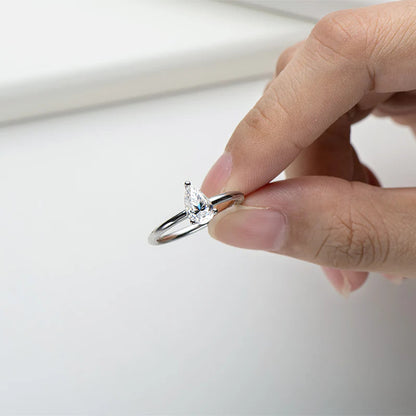 1 carat pear cut moissanite ring