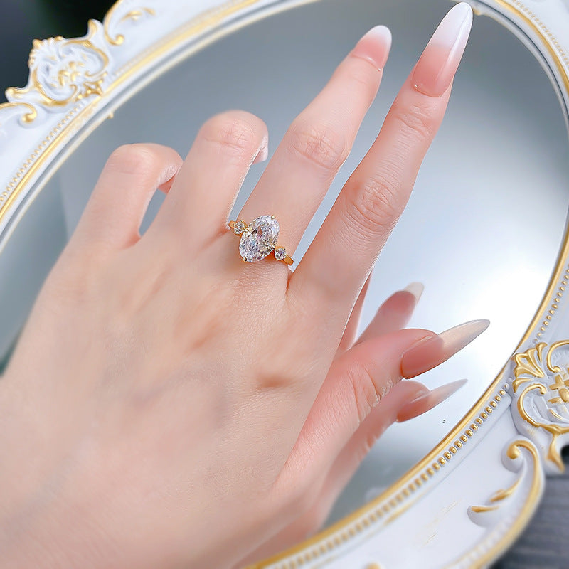 Three-Stone Oval Diamond Engagement Ring . Travel Engagement Ring