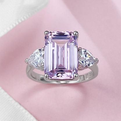 Pink 4 CT Emerald Cut Three-Stone Ring. Silver 925