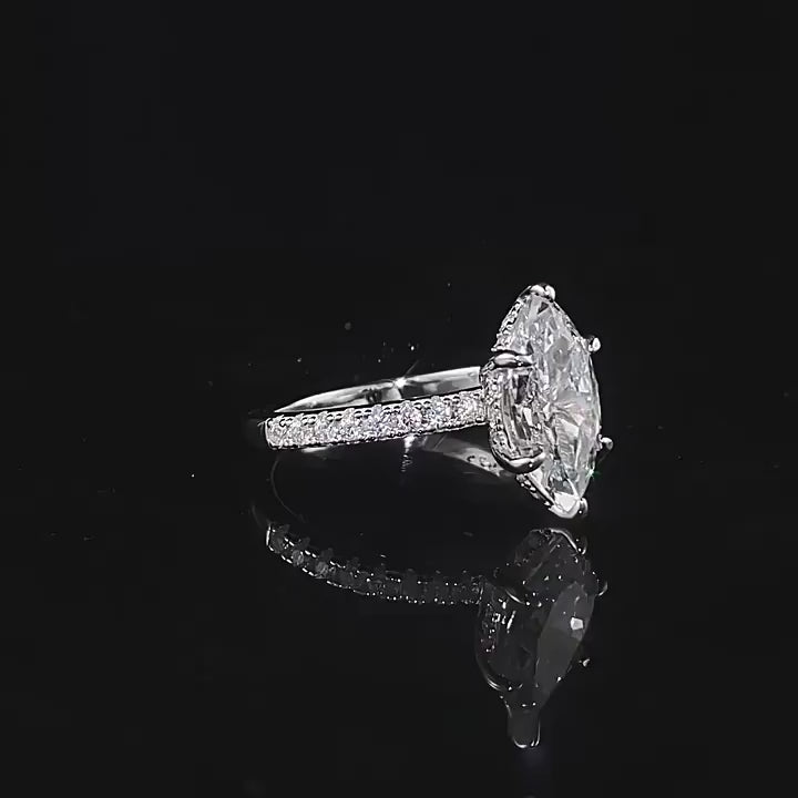 Crushed Ice. Hidden Halo Marquise Cut Ring
